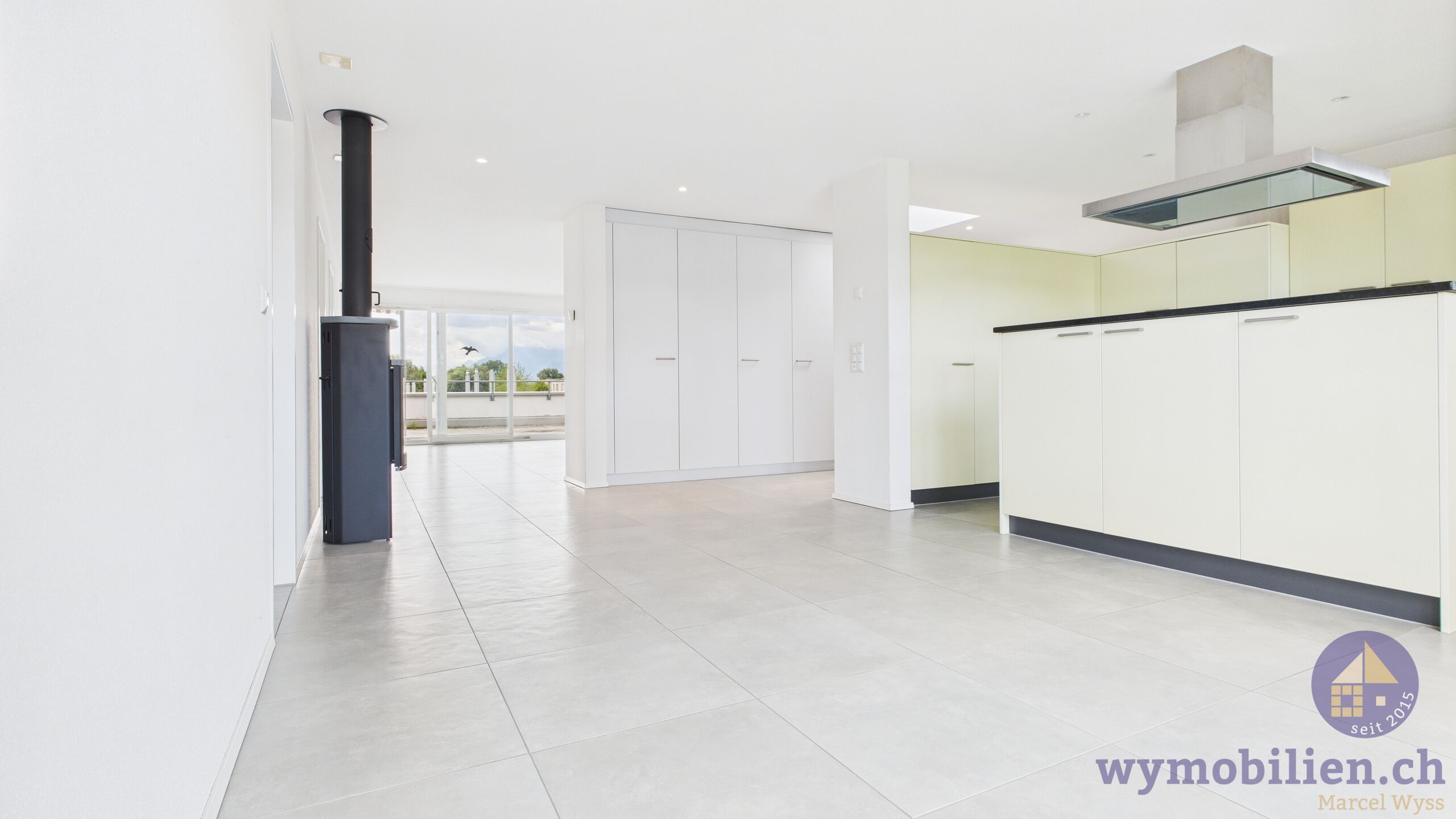 Essbereich/Küche mit Cheminéeofen