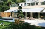 Elegant lake-front apartment with private garden and swimming pool