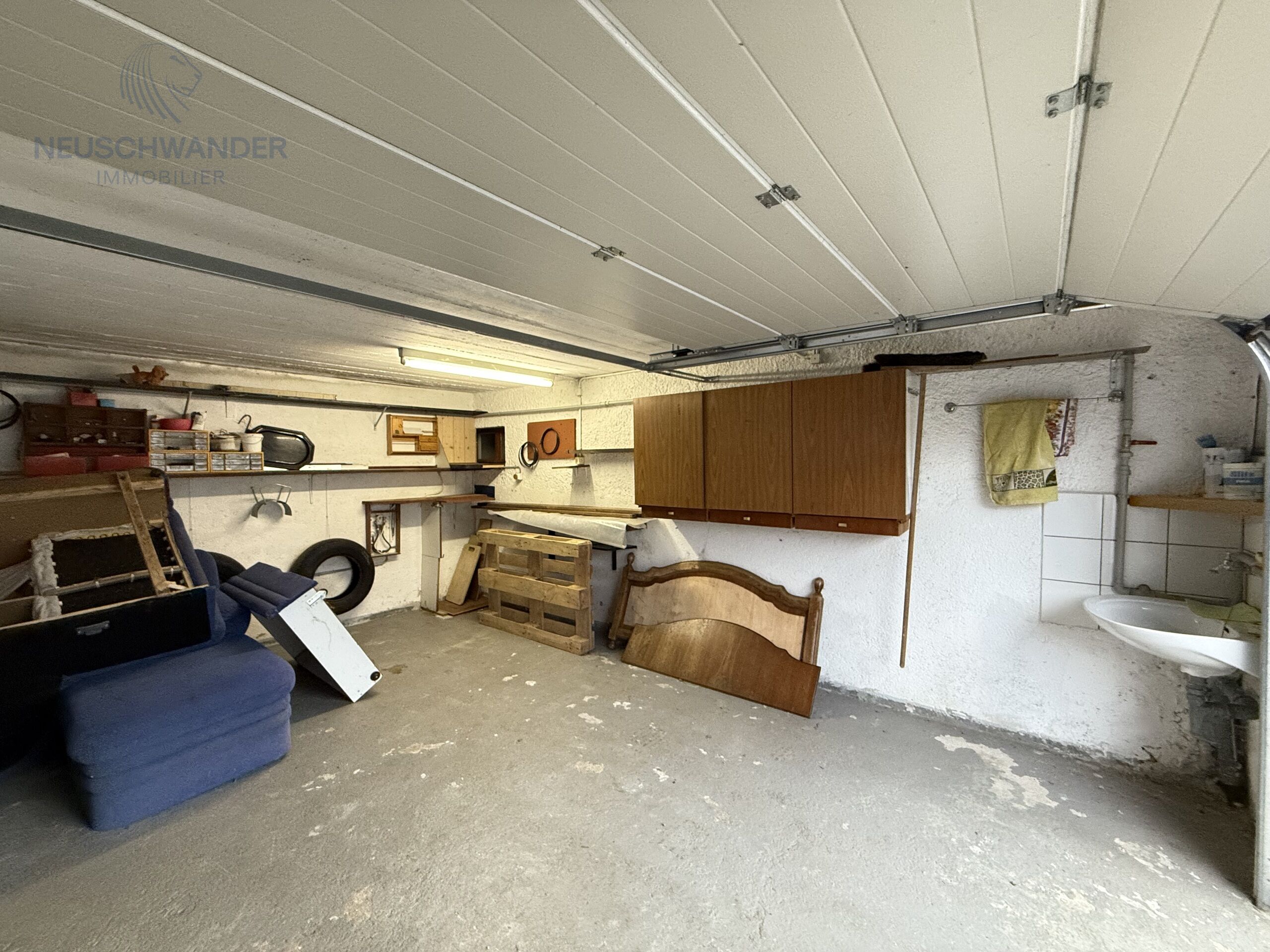 garage avec lavabo