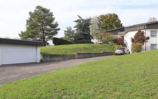 Family house located on a large plot of land.
