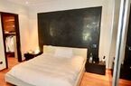 Elegant lake-front apartment with private garden and swimming pool