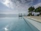 Luxueuse propriété avec piscine à débordement
Vue lac panoramique