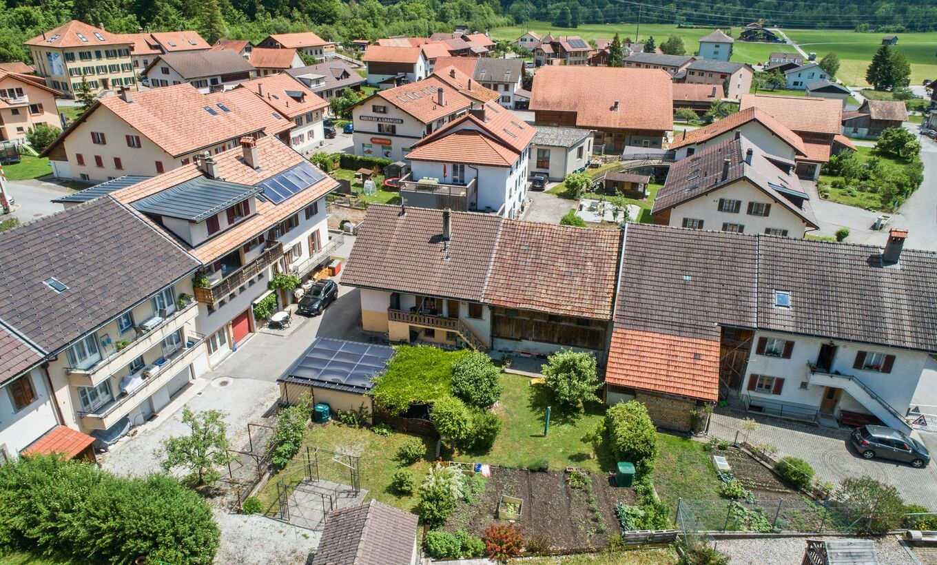 Village house with interesting expansion potential!