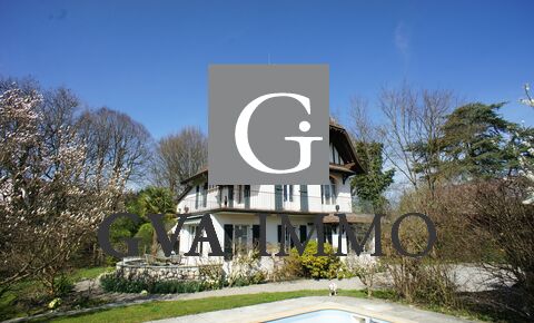 Charming mansion on beautiful wooded parcel