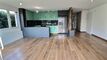 BEL APPARTEMENT D'ANGLE TRAVERSANT RENOVE 4,5 PCES  EN REZ-DE-JARDIN