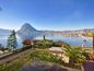 Квартира с большой террасой и прекрасным видом на озеро Лугано