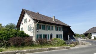Habitation de 3 appartements avec terrain de 1'959 m² et garage