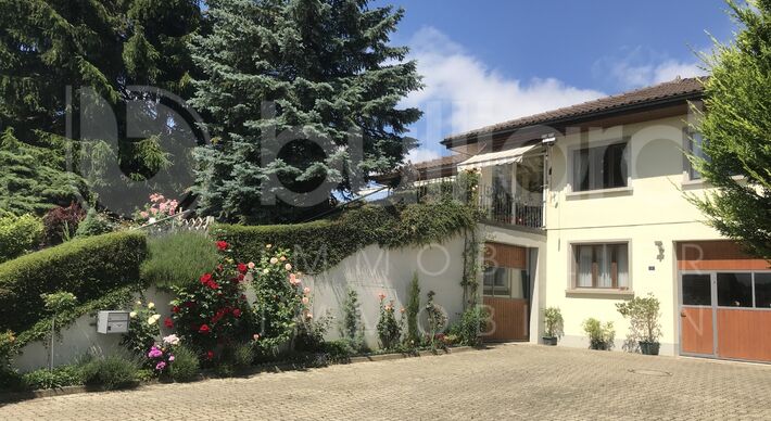 Maison individuelle 5.5 p et dépôt-atelier au sous-sol de + 100 m2