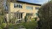 Mehrfamilienhaus mit Doppelgarage und Baulandreserve