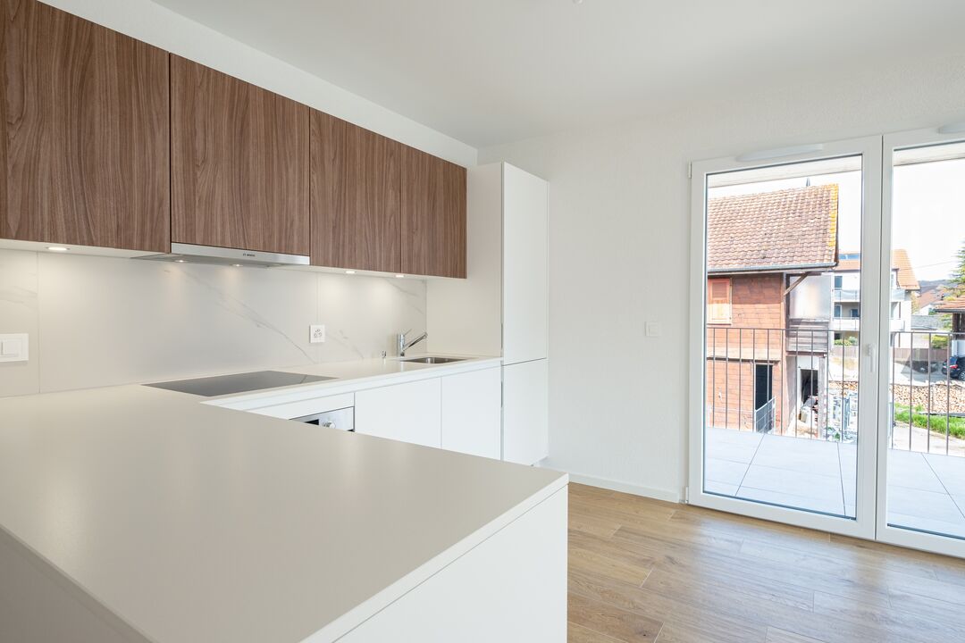 Construction d'un petit immeuble au style villageois avec 6 appartements : l'intérieur.