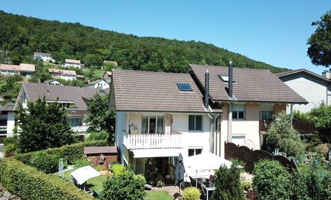 Very well maintained double family house with garden and parking space