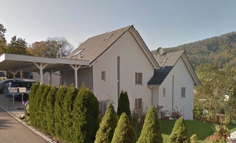 Double family house with garden and double carport