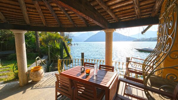 Beautiful lakeside villa with boat house and dock