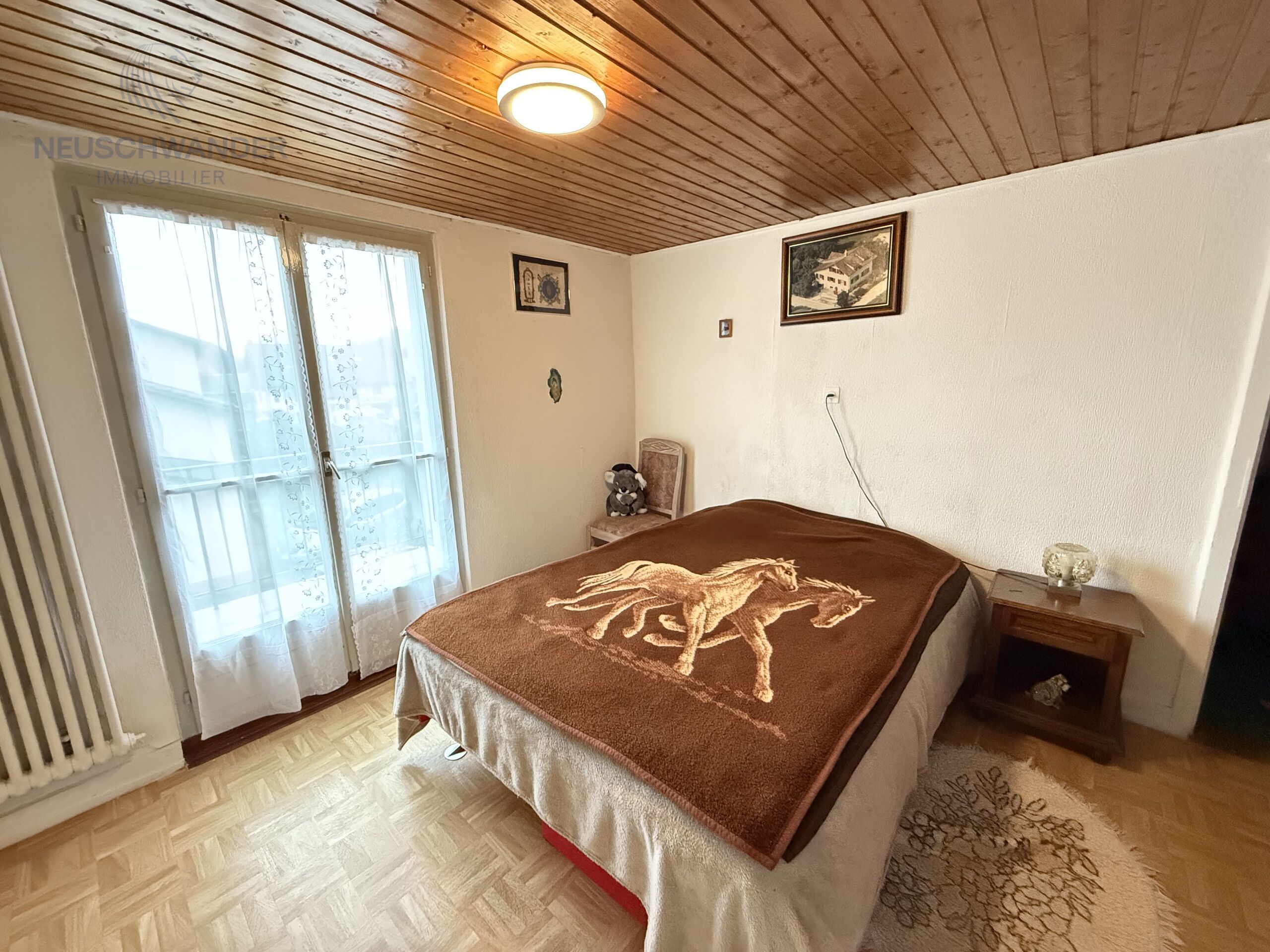 chambre Sud-Est avec balcon, réduit mansardé et WC