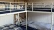 Ferme mitoyenne rénovée avec grand terrain agricole adjacent.
