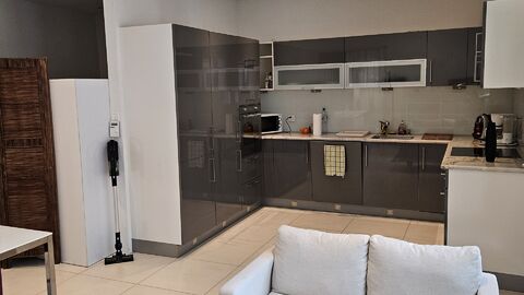 Studio meublé avec véranda et jardin au centre de Cortaillod