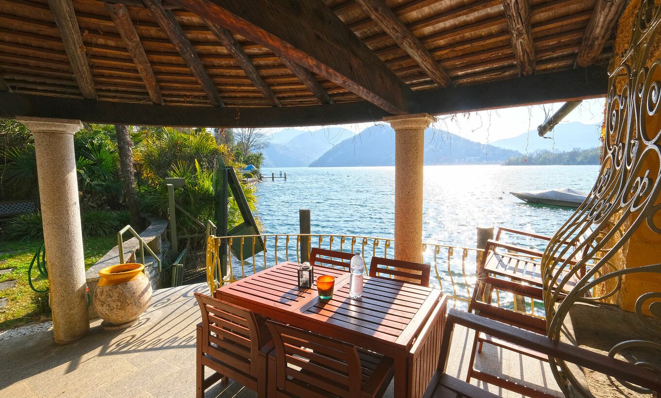 Beautiful lakeside villa with boat house and dock