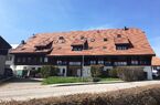 APPARTEMENT AVEC TERRASSE
DANS UNE ANCIENNE FERME RENOVEE
