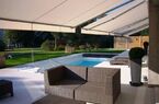 Elegant lake-front apartment with private garden and swimming pool