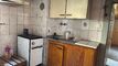 Appartamento in casa di paese di 3,5 locali con 3/4 di fienile e giardino