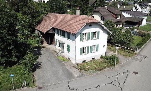 Totally in need of renovation farmhouse with barn and surrounding area
