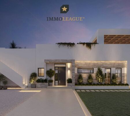 Die modern beleuchtete Eingangszone bildet das Entree der Luxusvilla.