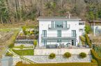 Moderna e luminosa villa mono-bifamiliare con splendida vista aperta