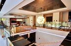 Elegant lake-front apartment with private garden and swimming pool