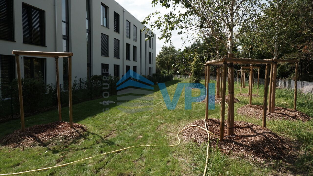 jardin commun à l'arrière de l'immeuble