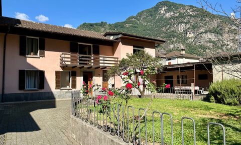 Versatile property with two residential units, garages and grounds