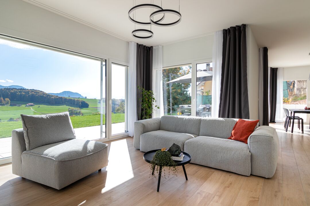 Projet immobilier aux Fiaugères avec 2 maisons construites, le salon