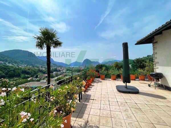 Cozy two-family house with wonderful view on the lake and on Lugano