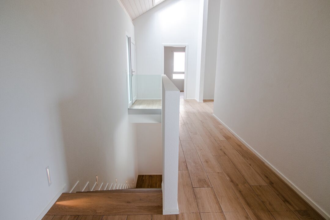 Projet immobilier aux Fiaugères avec 2 maisons construites, les escaliers
