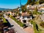 Casa Unifamiliare con Giardino e Vista sul Lago di Lugano