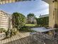 Idéalement situé, appartement en location avec terrasse et jardin