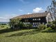 Belle ferme fribourgeoise 
située dans un écrin de verdure