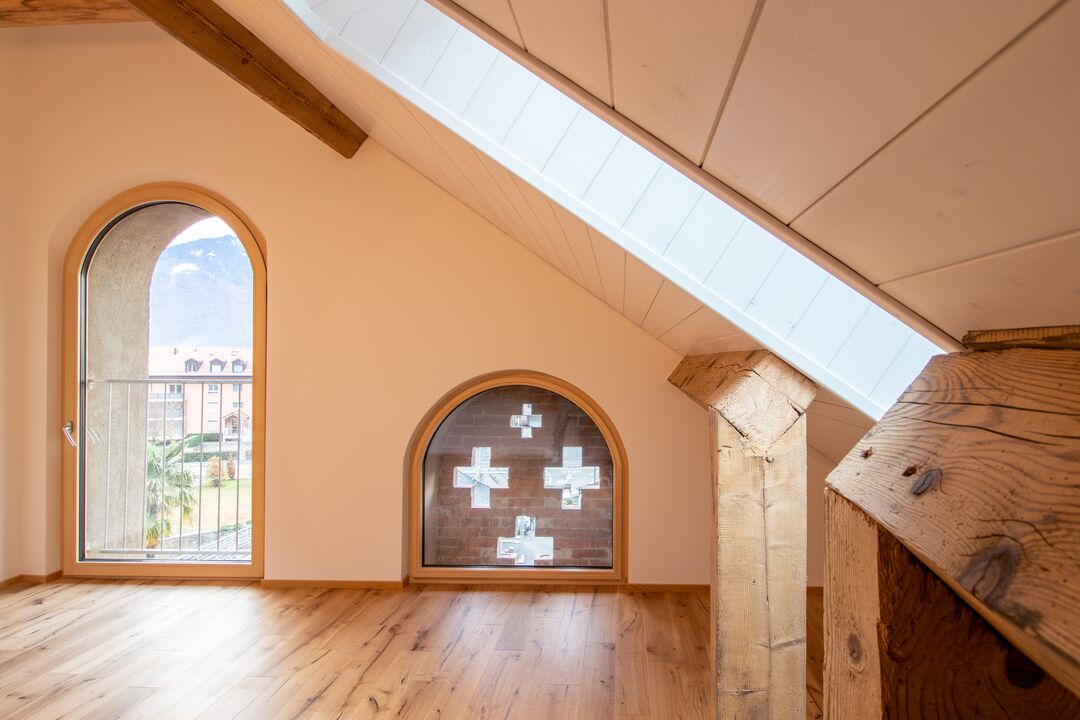 Rénovation d'une ferme du 19e siècle en 15 appartements à Roche : l'intérieur.