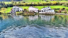 Sonnige Seeliegenschaft direkt am See