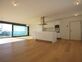 Appartement contemporain de 122.5 m2 pondérés avec une splendide vue lac