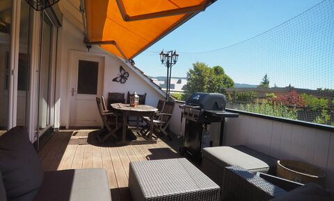 Renovated and spacious attic apartment with a sunny terrace