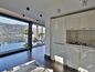 Modern Luxury Villa with Lugano Lake View and Private Boat House