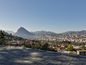 Современная вилла с видом на город, озеро Лугано и Горы