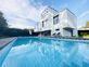 Exclusivité
Magnifique villa contemporaine avec piscine et vue lac