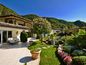 Villa di Lusso in Stile Mediterraneo con Vista Lago di Lugano