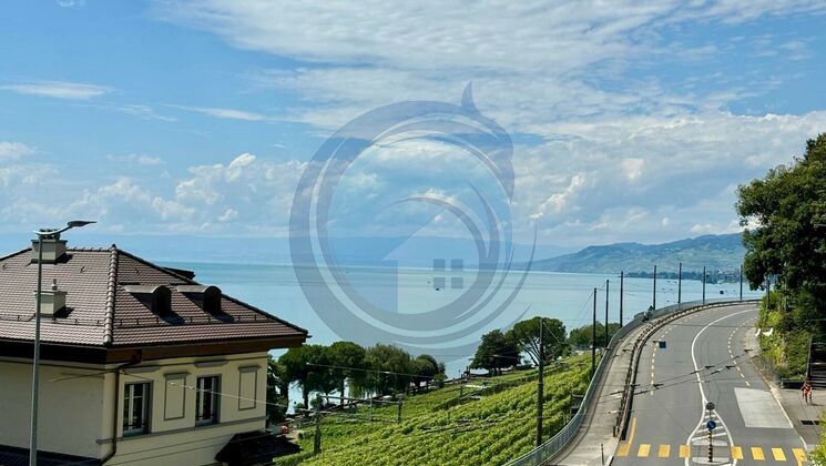 CHARMANT APPARTEMENT DE 4.5 PIÈCES AVEC VUE IMPRENABLE SUR LE LAC