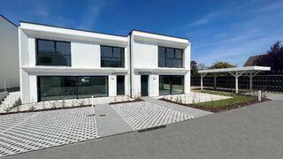 Maisons triplex de 4½ pièces dans un petit quartier résidentiel