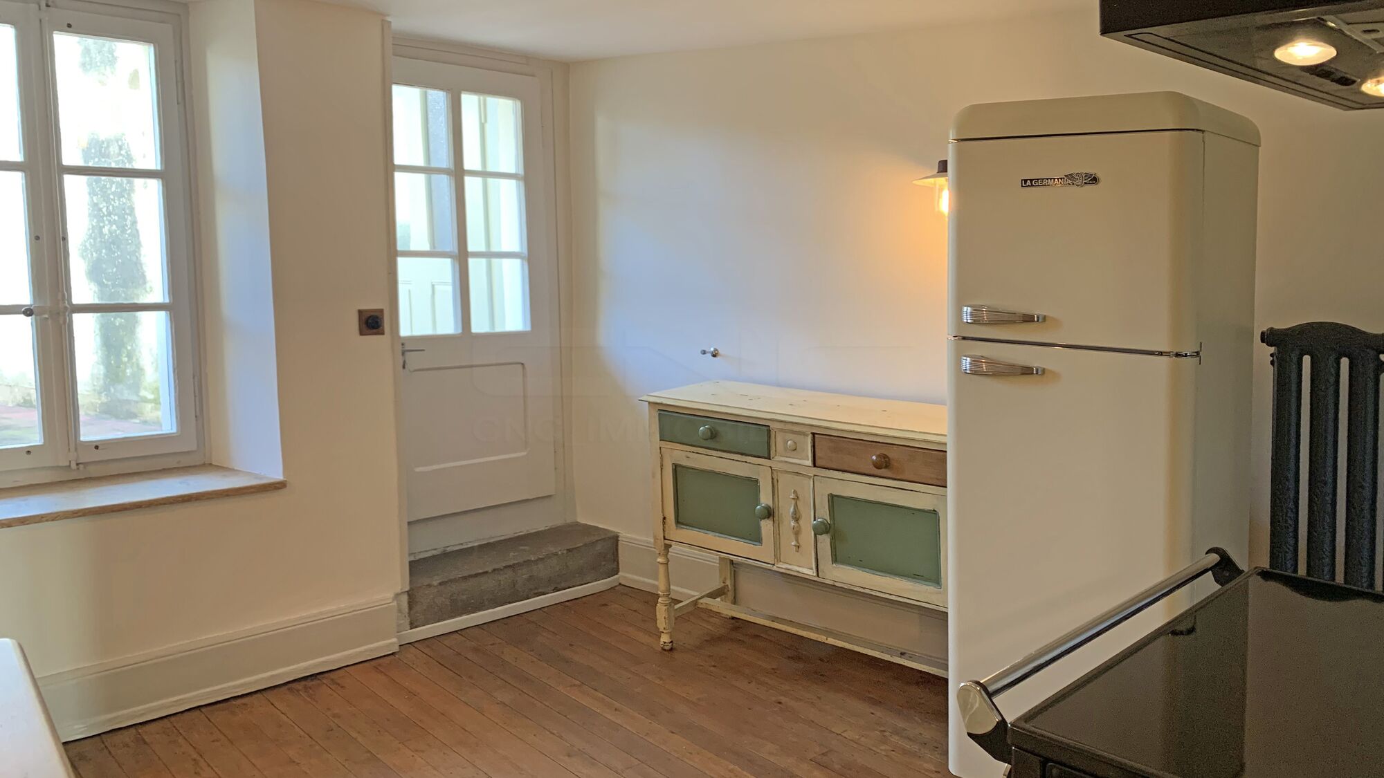 Lot 1 - Cuisine donnant accès à la terrasse et jardin - 1er étage