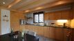 Chalet en finition aux Mosses, bordure ruisseau sans personne devant.