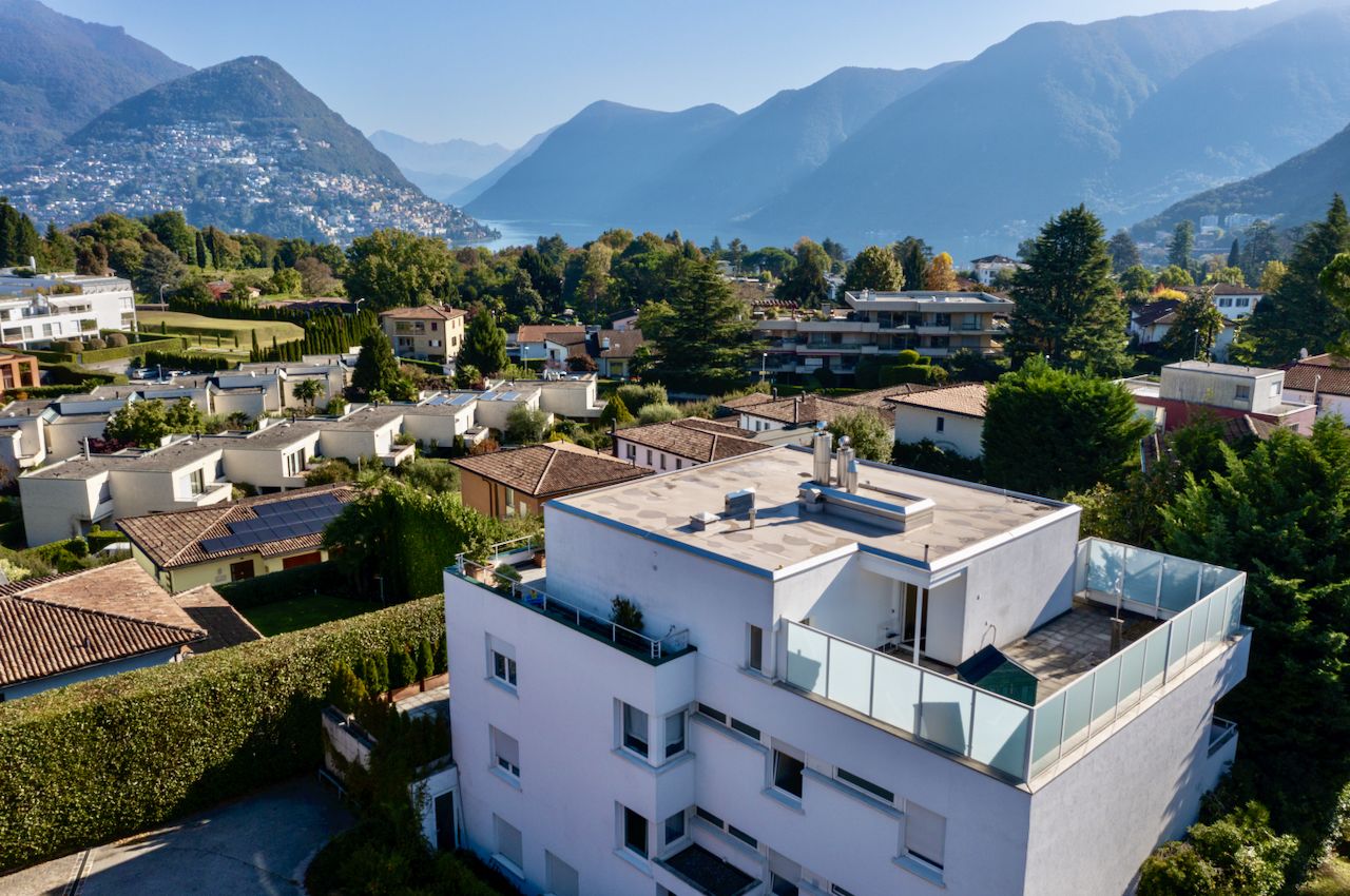 Investment Building with View of Lake Lugano and Surrounding Mountains