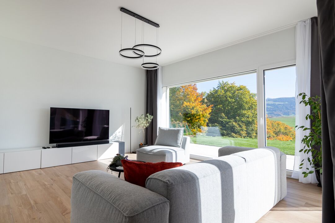 Projet immobilier aux Fiaugères avec 2 maisons construites, le salon